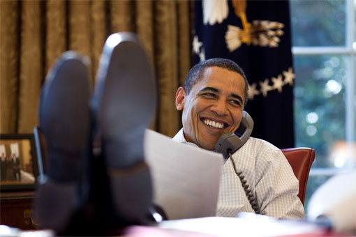 Barack Obama, putting his feet up on furniture in the White House