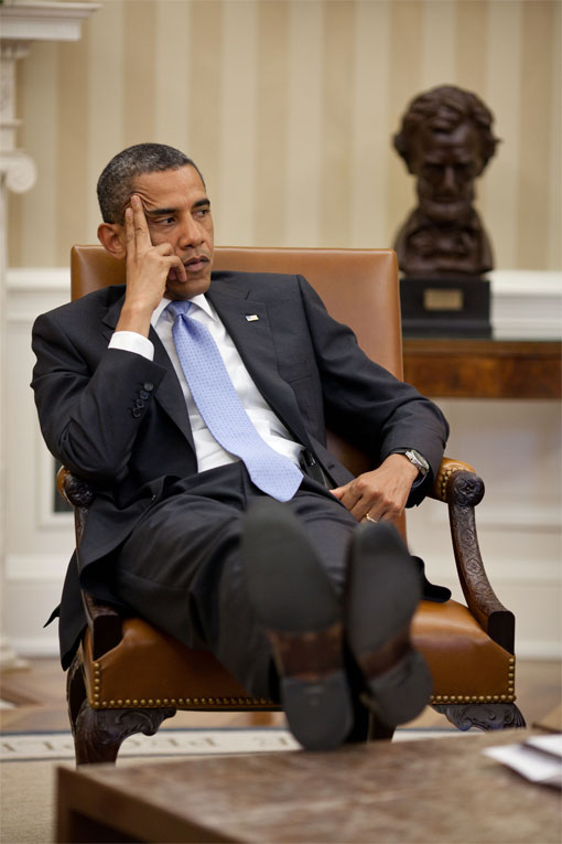 Barack Obama, putting his feet up on furniture in the White House